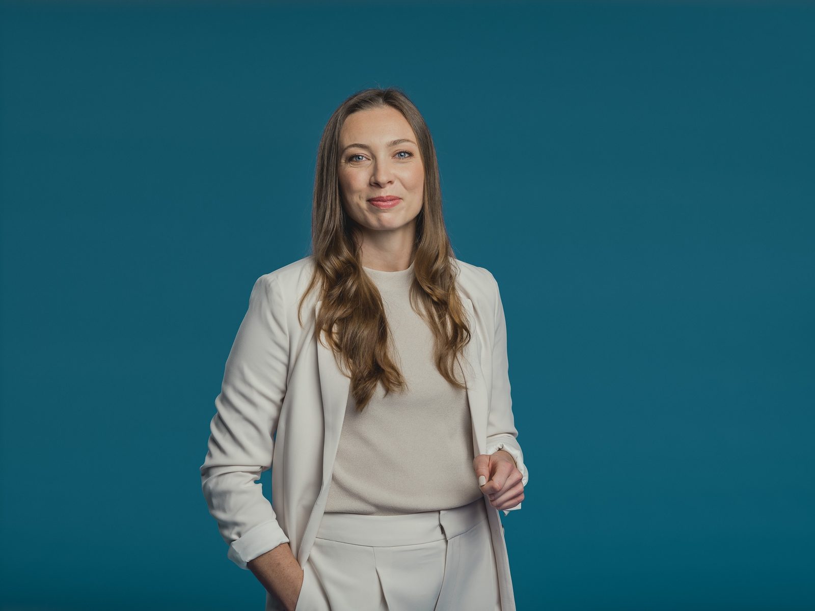 Dr. Jessica Metcalfe: portrait, cream suit